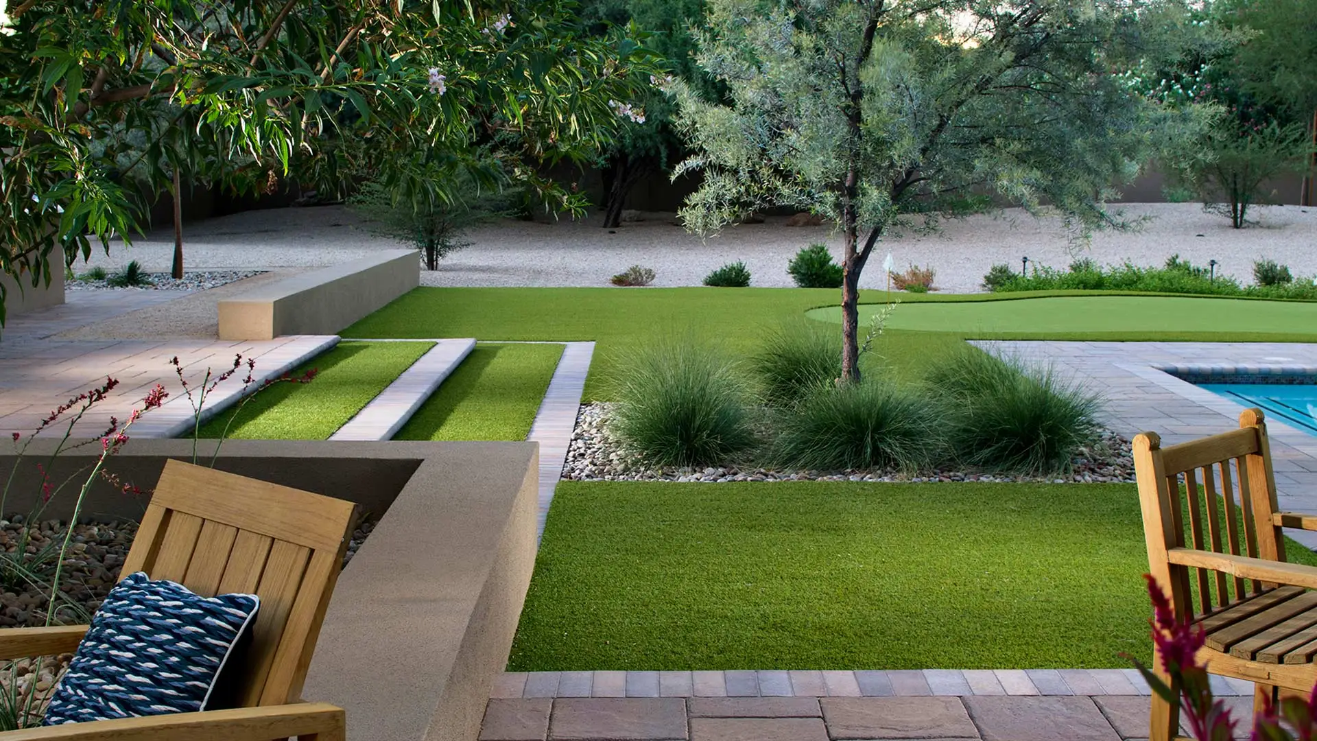 Outdoor paver patio with artificial turf in San Francisco, CA.
