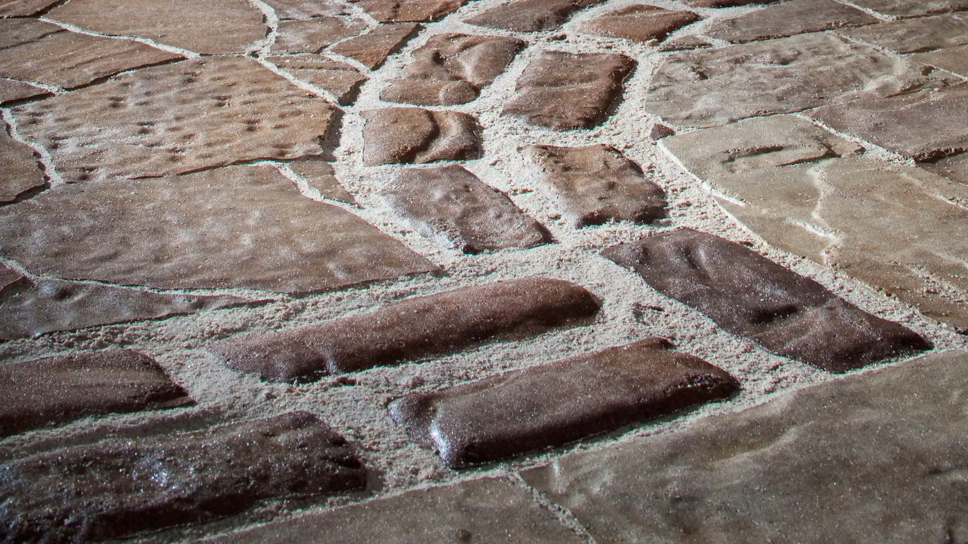 Outdoor paver patio pattern design installation in Lincoln Park, CA.