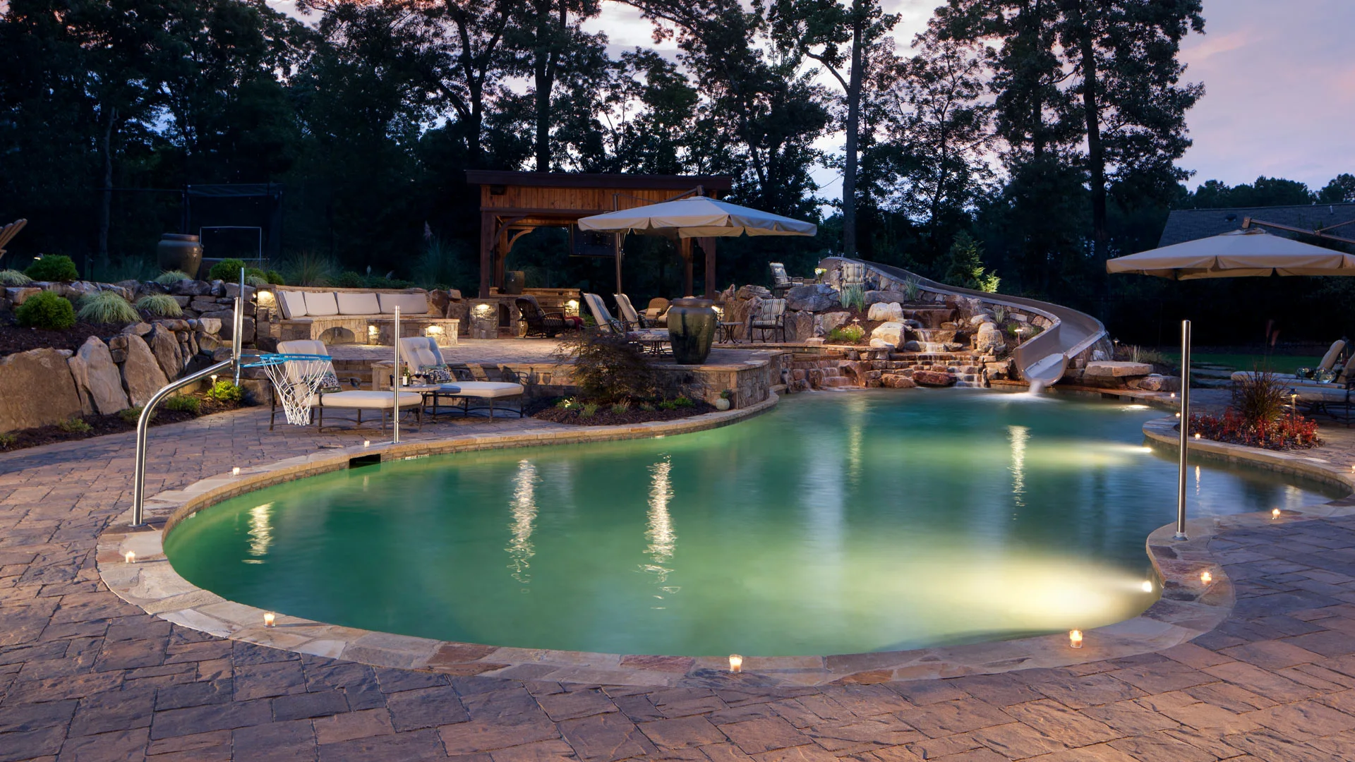 Outdoor pool paver patio with outdoor kitchen in San Pablo, CA.