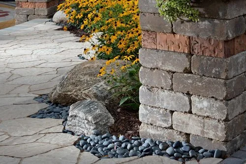 Using Concrete Pavers with Pebbles or River Stones For a Walkway