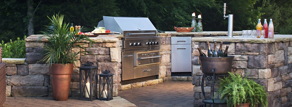 Custom outdoor kitchen and paver patio installed for a homeowner in Oakland, CA.
