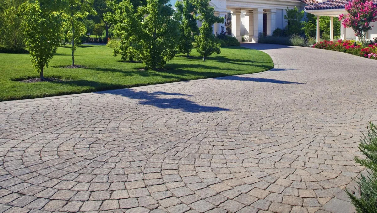 Home in San Jose, CA with a patterned paver driveway.